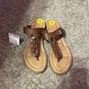 Brown braided flip flop